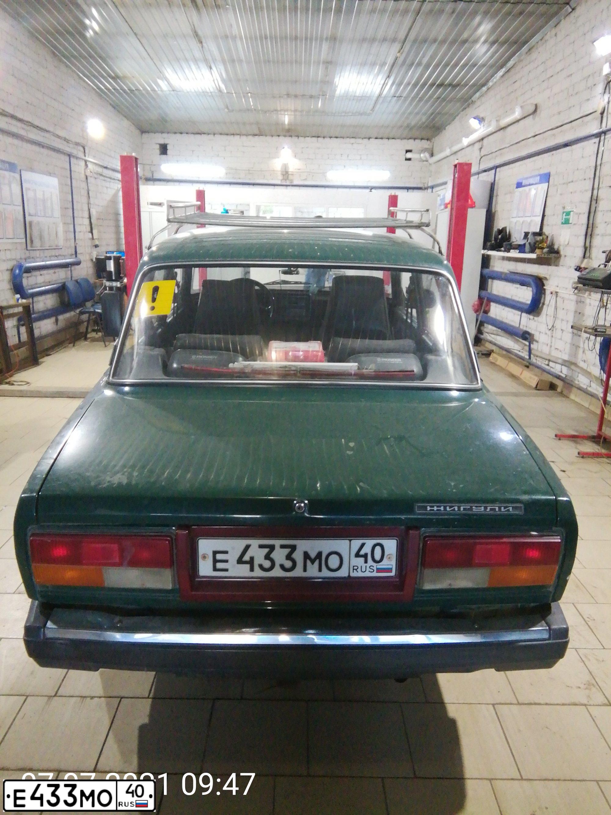 Фото автомобиля LADA 2107, 1999 — госномер Е433МО40. Цвет: ЗЕЛЕНЫЙ