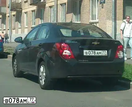 Фото автомобиля CHEVROLET AVEO, 2012 — госномер В078АМ77. Цвет: ЧЕРНЫЙ