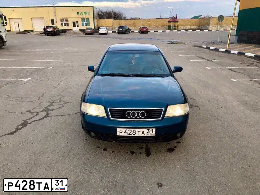Фото автомобиля AUDI A6, 1998 — госномер Р428ТА31. Цвет: СИНИЙ