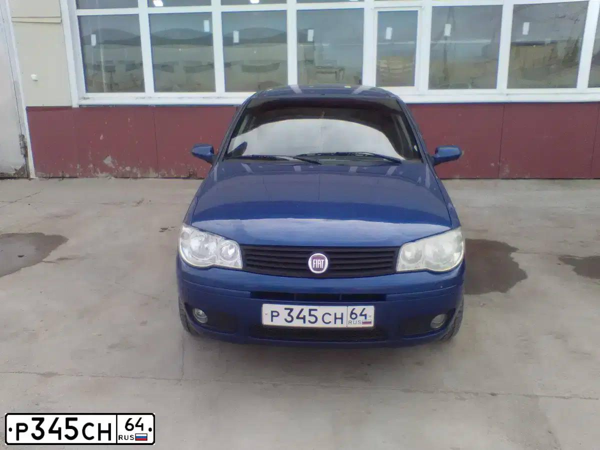 Фото автомобиля FIAT ALBEA, 2009 — госномер Р345СН64. Цвет: СИНИЙ ТЕЗЕЙ