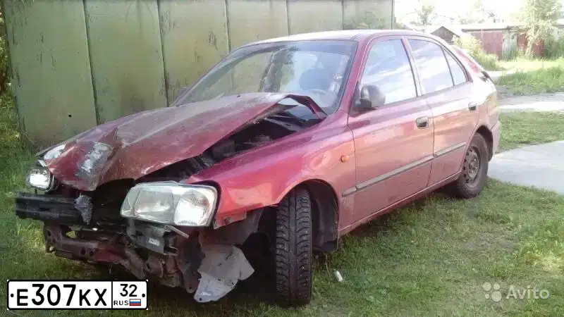 Фото автомобиля TAGAZ ACCENT, 2006 — госномер Е307КХ32. Цвет: Красный