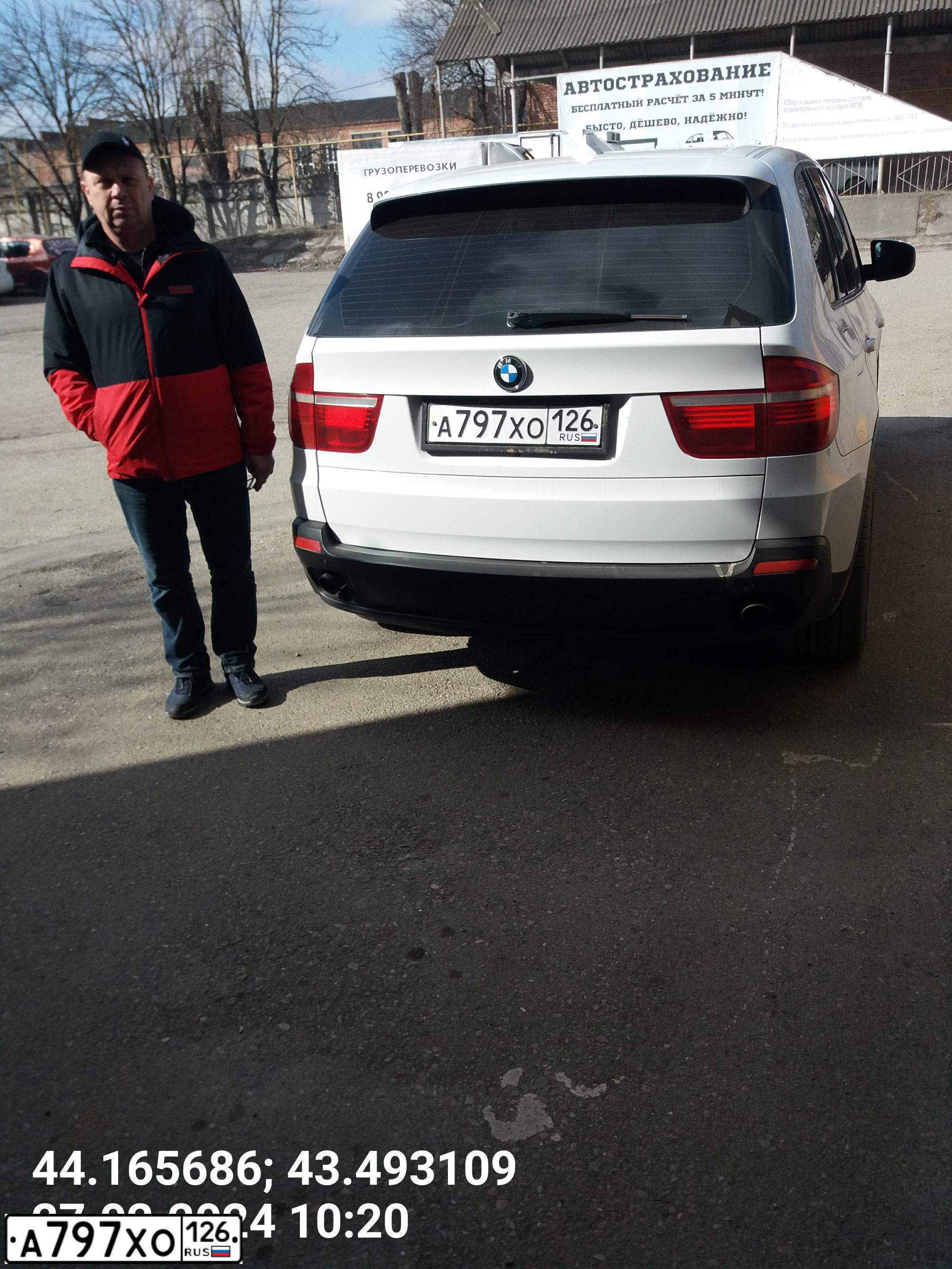 Фото автомобиля BMW X5, 2007 — госномер Р911АК126. Цвет: Белый