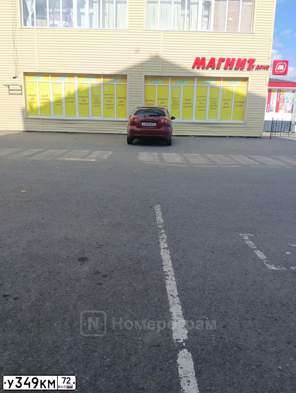 Фото автомобиля CHEVROLET LACETTI, 2005 — госномер У349КМ72. Цвет: ТЕМНО-КРАСНЫЙ