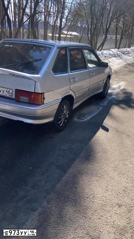 Фото автомобиля LADA 2114 SAMARA, 2004 — госномер Е973УУ46. Цвет: СВЕТЛО-СЕРЕБРИСТЫЙ МЕТАЛЛ