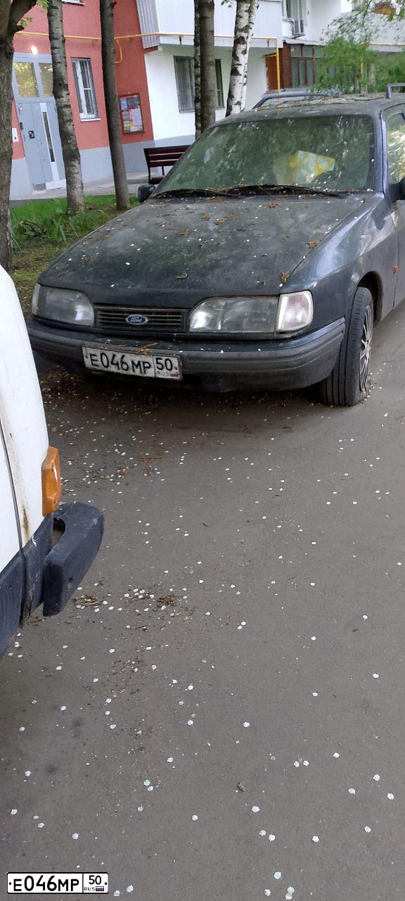 Фото автомобиля FORD SIERRA, 1992 — госномер Е046МР50. Цвет: СИНИЙ ТЕМНЫЙ