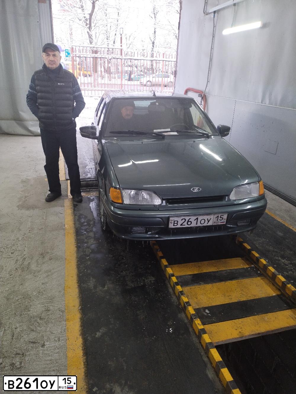 Фото автомобиля LADA 2114 SAMARA, 2011 — госномер В261ОУ15. Цвет: СЕРО-СИНЕ-ЗЕЛЕНЫЙ