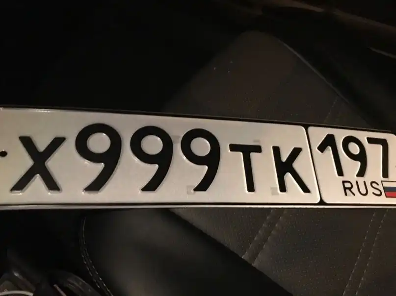 Фото автомобиля KIA RIO, 2012 — госномер Х175ЕК05. Цвет: ЧЕРНЫЙ