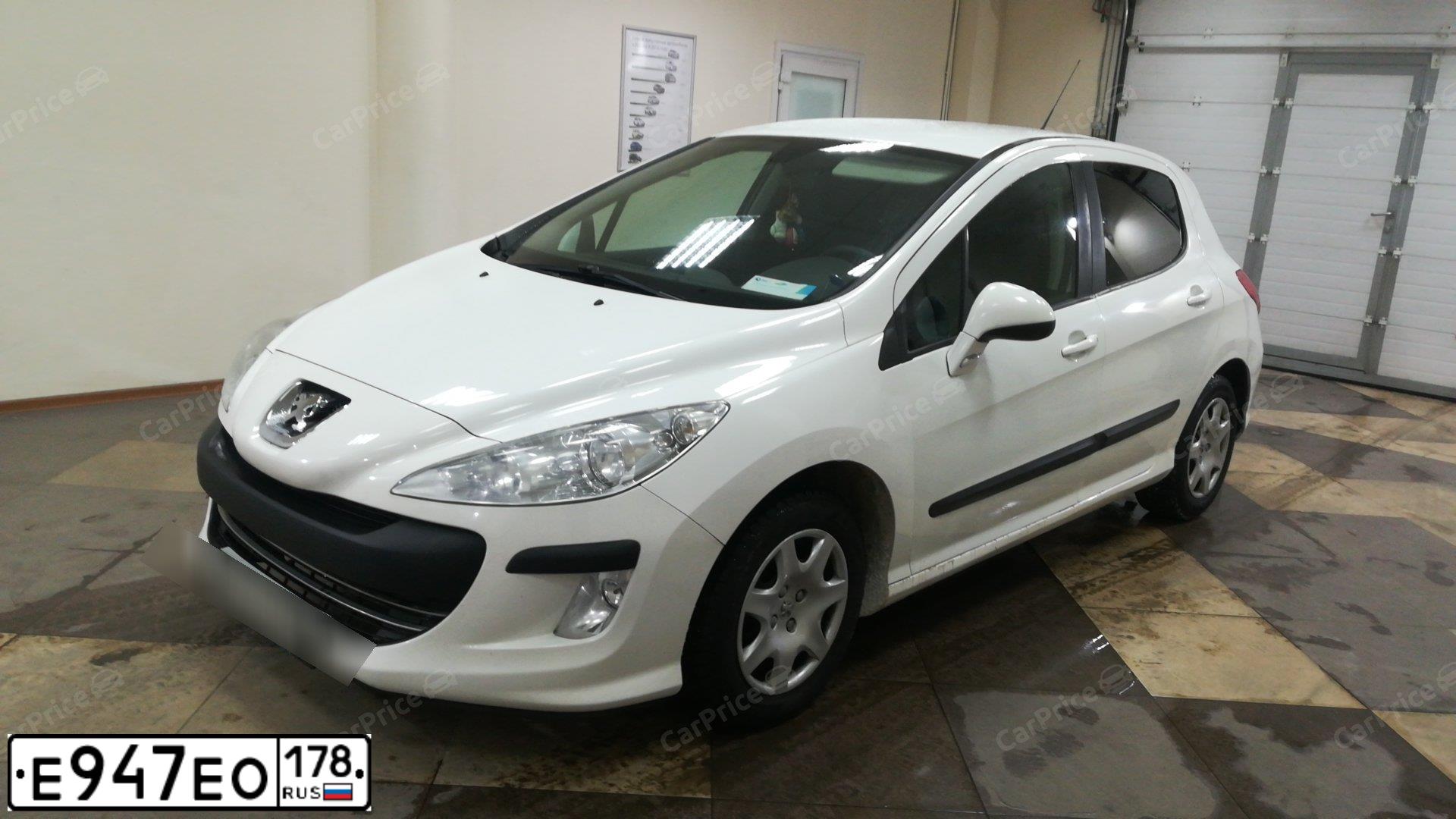 Фото автомобиля PEUGEOT 308, 2010 — госномер Е039КН147. Цвет: Белый