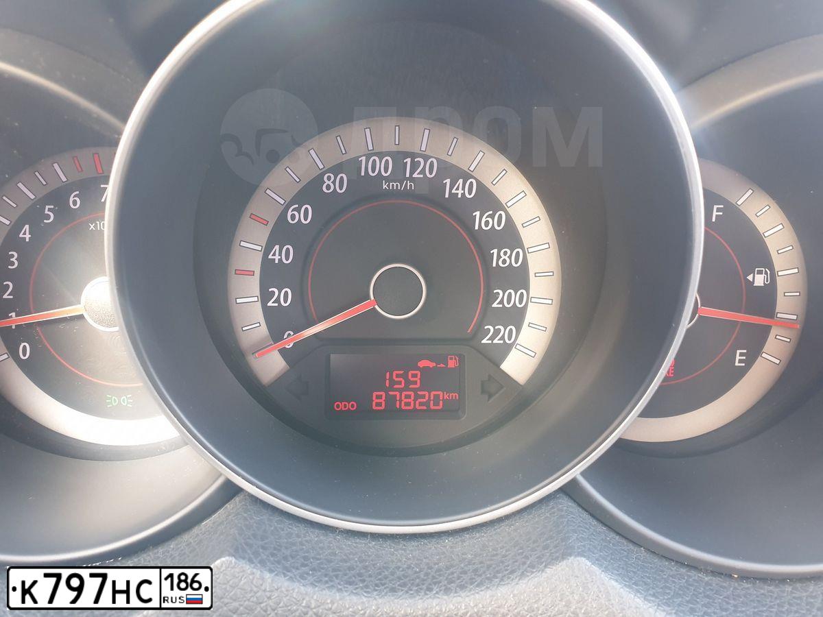 Фото автомобиля KIA CERATO, 2010 — госномер К797НС186. Цвет: Серебристый