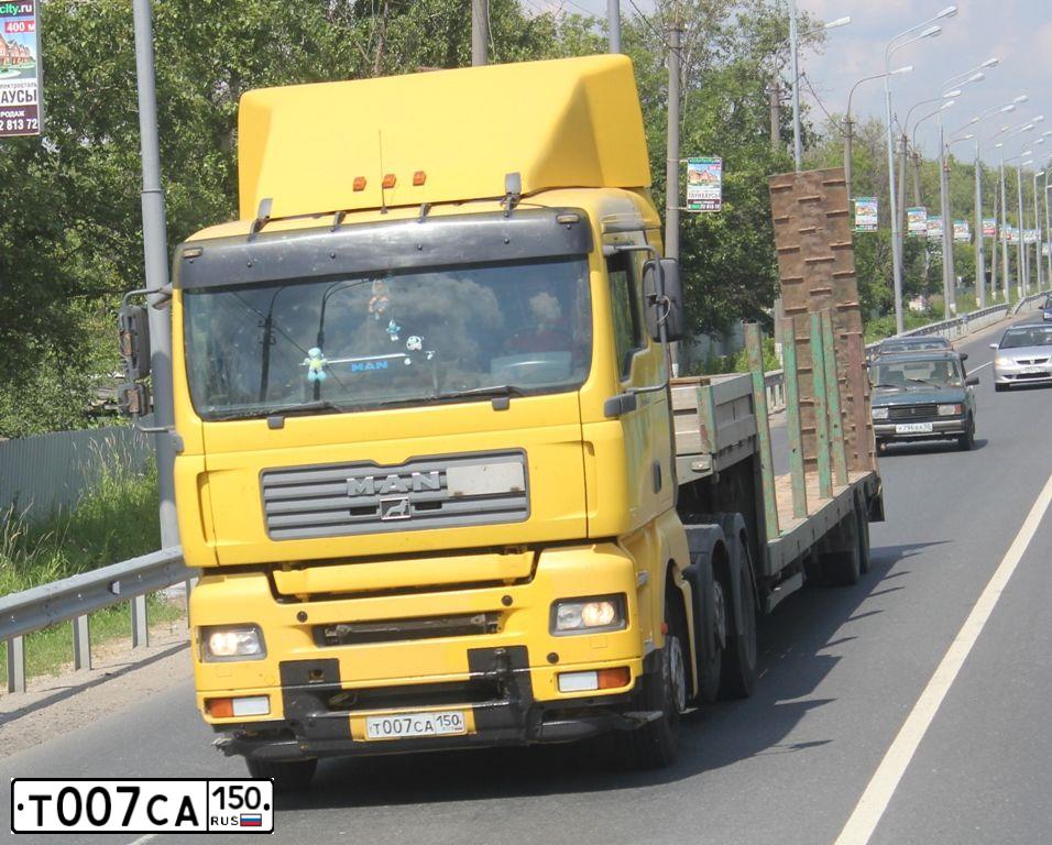 Фото автомобиля MAN TGA 26.XXX /6X2/, 2003 — госномер Т007СА150. Цвет: ЖЕЛТЫЙ