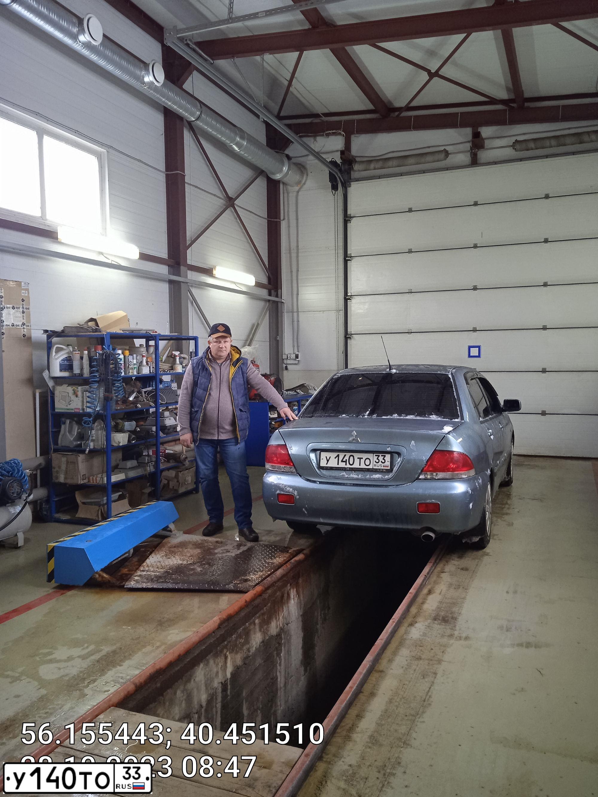 Фото автомобиля MITSUBISHI LANCER, 2006 — госномер У140ТО33. Цвет: СВЕТЛО-СЕРО-ЗЕЛЕНЫЙ