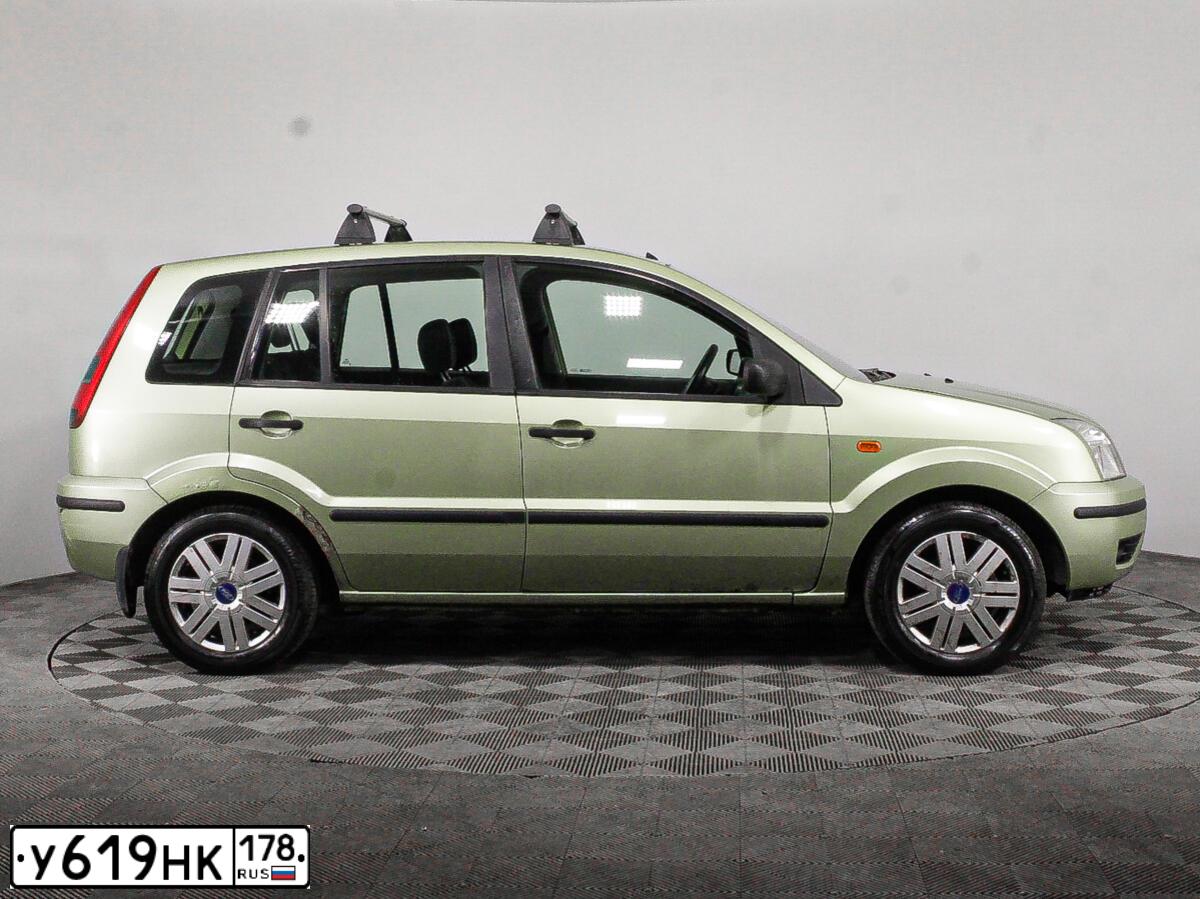 Фото автомобиля FORD FUSION, 2004 — госномер Е039ЕН147. Цвет: СВЕТЛО-ЗЕЛЕНЫЙ
