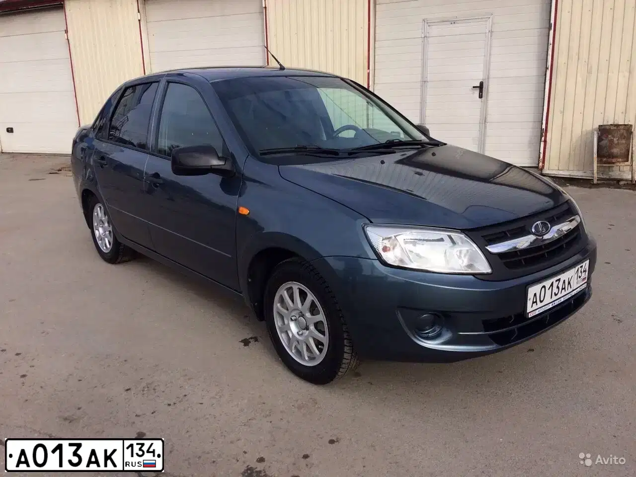 Фото автомобиля LADA 2190 GRANTA, 2013 — госномер А013АК134. Цвет: СЕРО-СИНИЙ