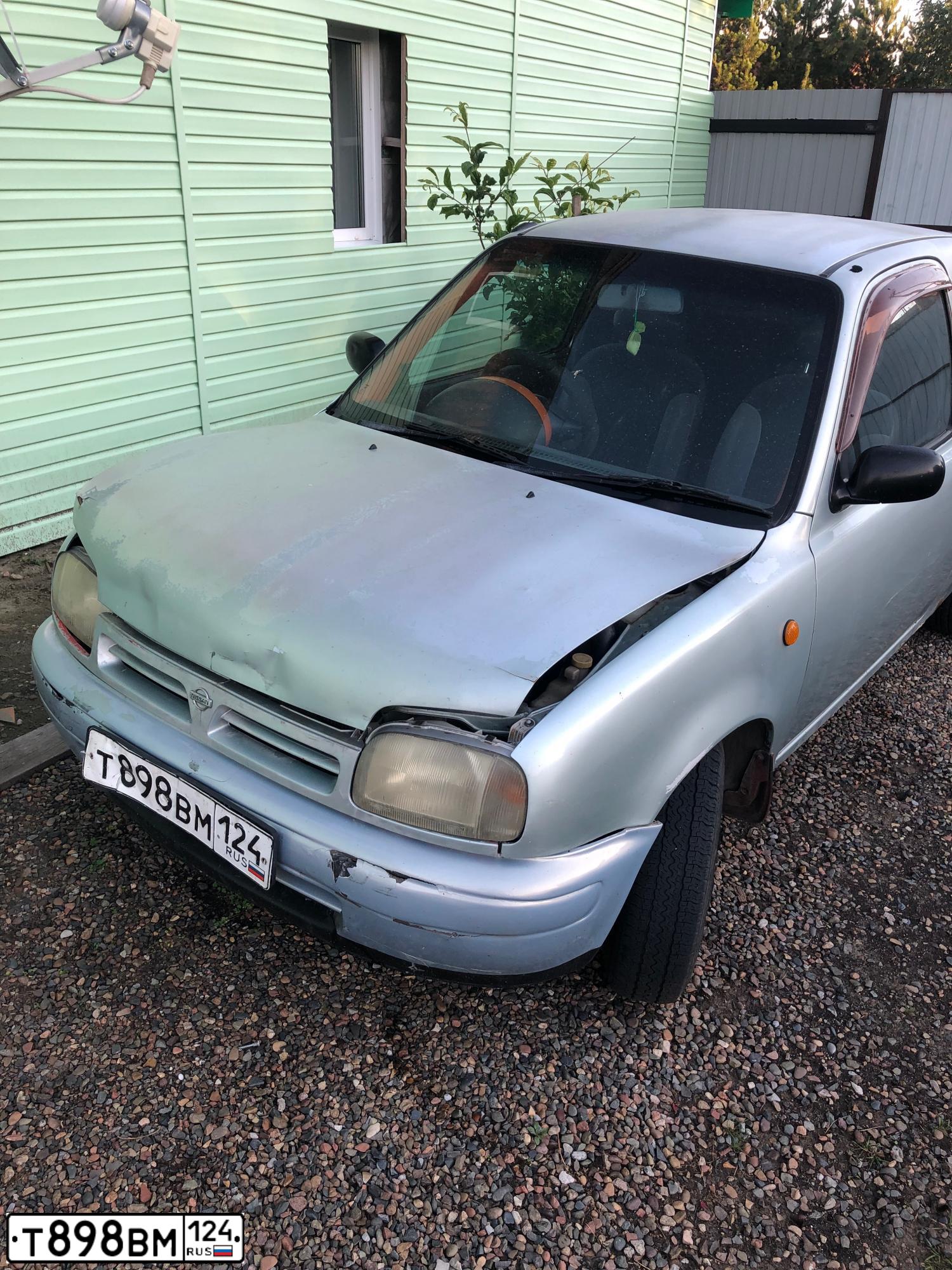 Фото автомобиля NISSAN MARCH, 1997 — госномер Т898ВМ124