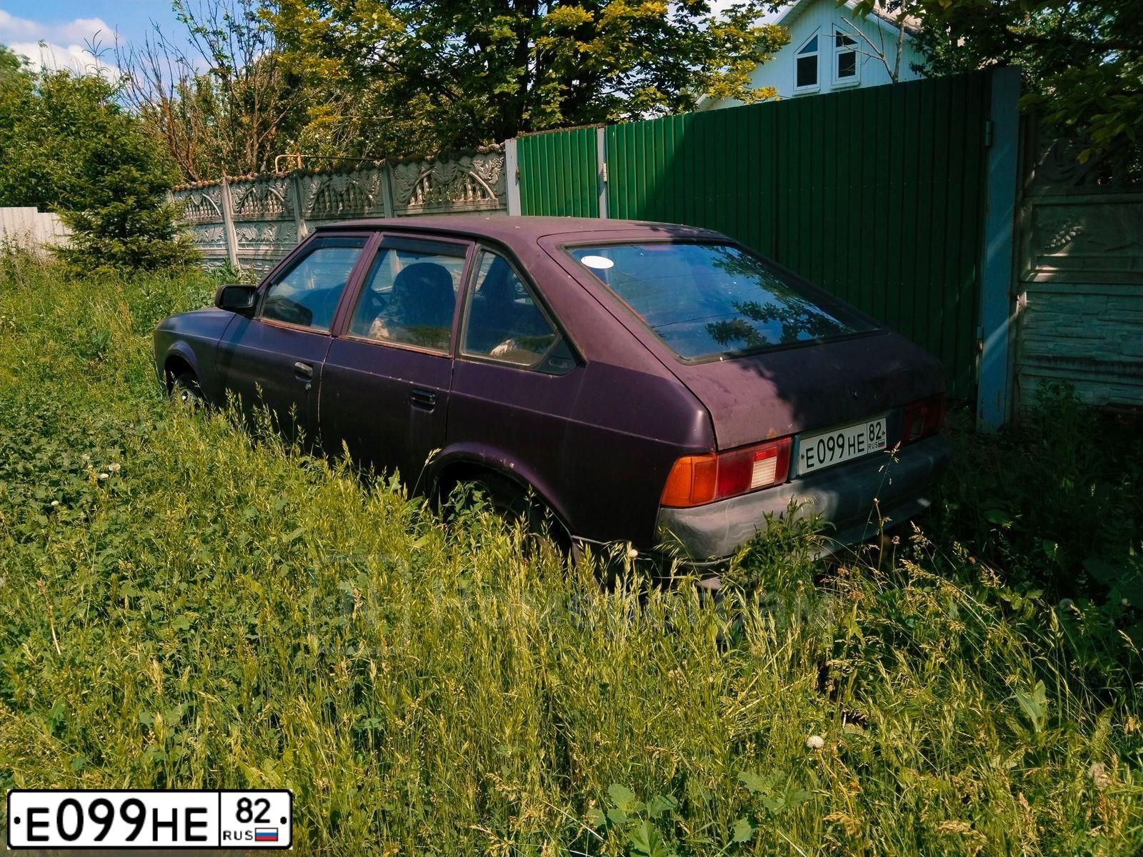 Фото автомобиля AZLK MOSKWITSCH 2141, 1999 — госномер Е099НЕ82. Цвет: ТЕМНО-ФИОЛЕТОВЫЙ