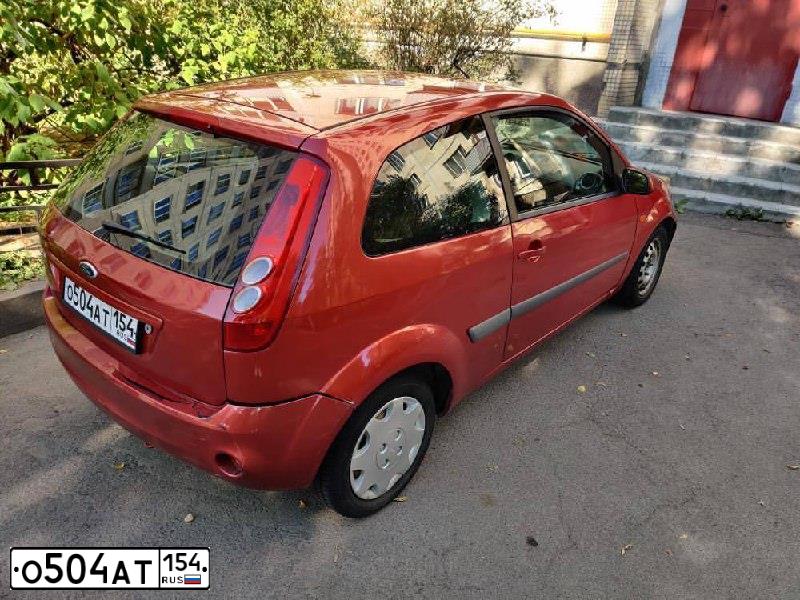 Фото автомобиля FORD FIESTA, 2007 — госномер Н753КУ82. Цвет: Красный