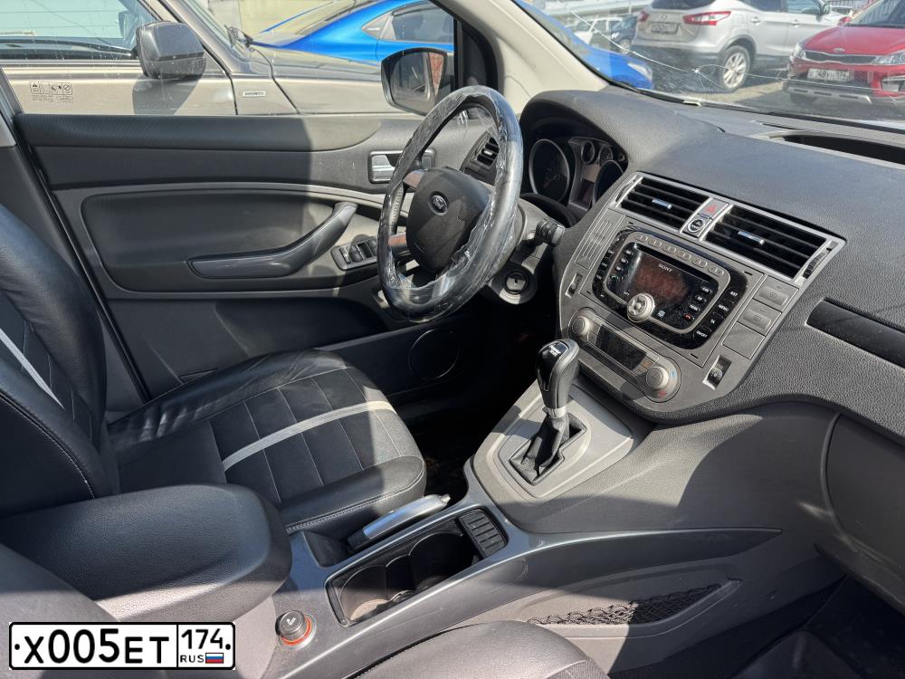 Фото автомобиля TOYOTA COROLLA, 2008 — госномер Х005ЕТ174. Цвет: ЧЕРНЫЙ