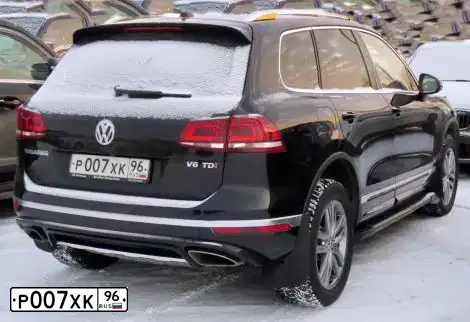 Фото автомобиля VOLKSWAGEN TOUAREG, 2020 — госномер Н401ОХ134. Цвет: ЧЕРНЫЙ