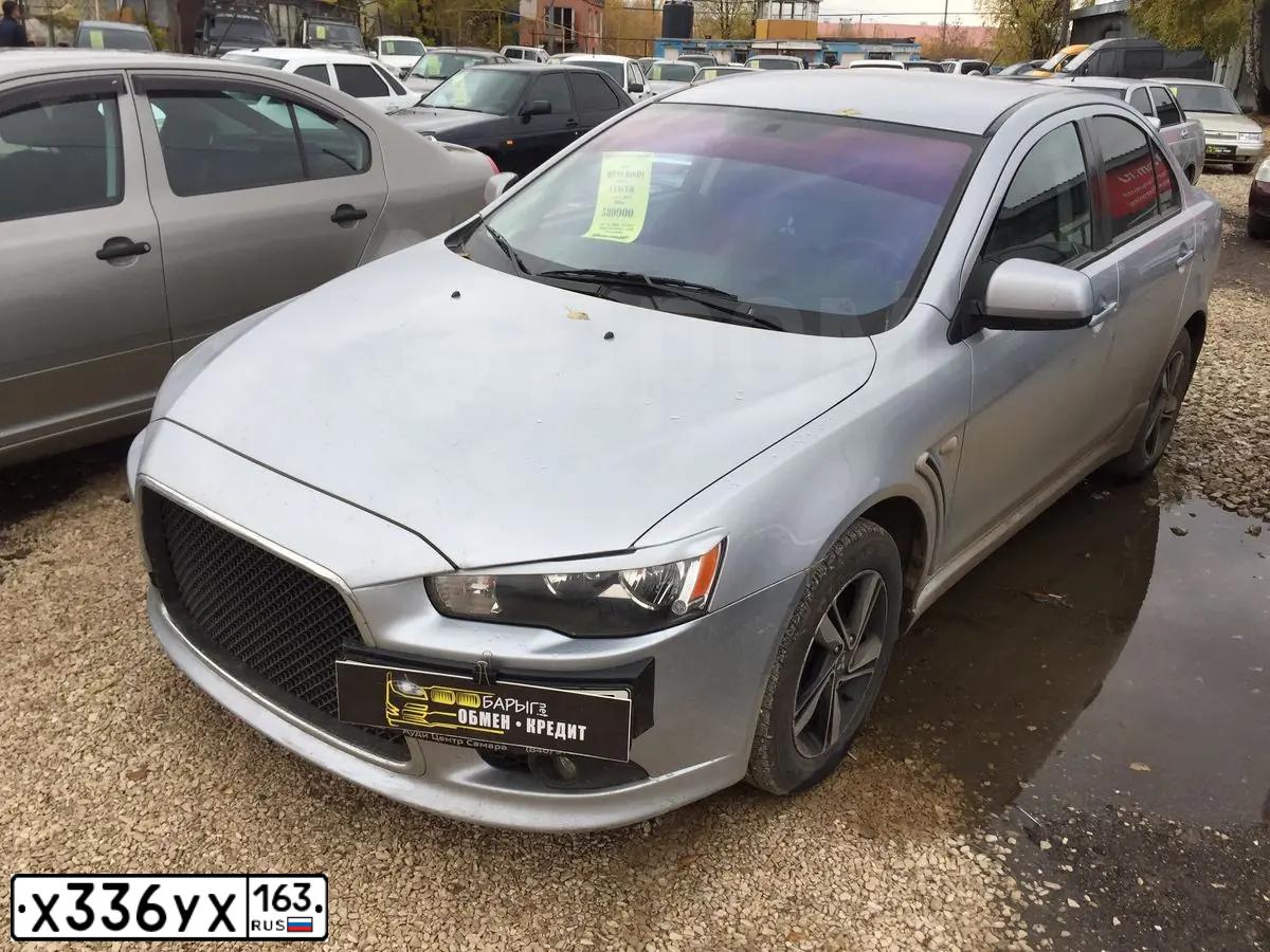 Фото автомобиля MITSUBISHI LANCER, 2012 — госномер У861МХ716. Цвет: Серебристый
