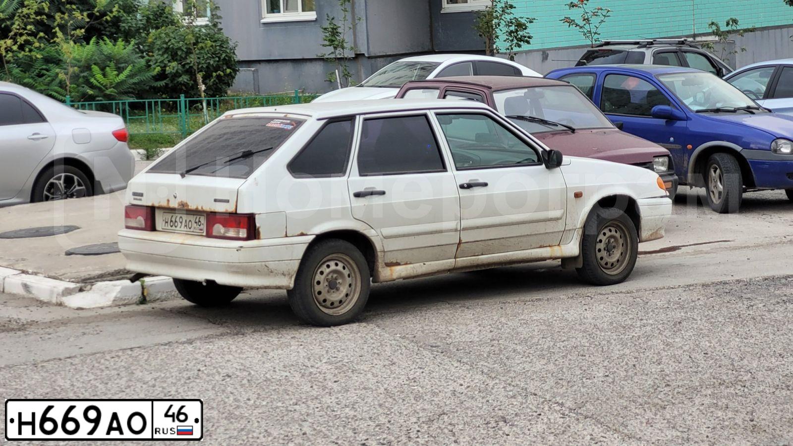 Фото автомобиля LADA 2114 SAMARA, 2013 — госномер Н669АО46. Цвет: БЕЛЫЙ