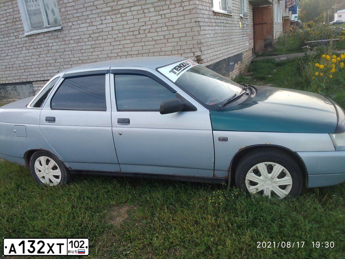 Фото автомобиля LADA 2110, 2004 — госномер Е336ХТ702. Цвет: Серебристо-Желтый