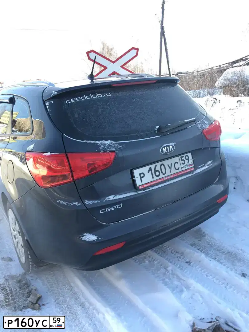 Фото автомобиля KIA CEE'D, 2013 — госномер Р160УС59. Цвет: Серый