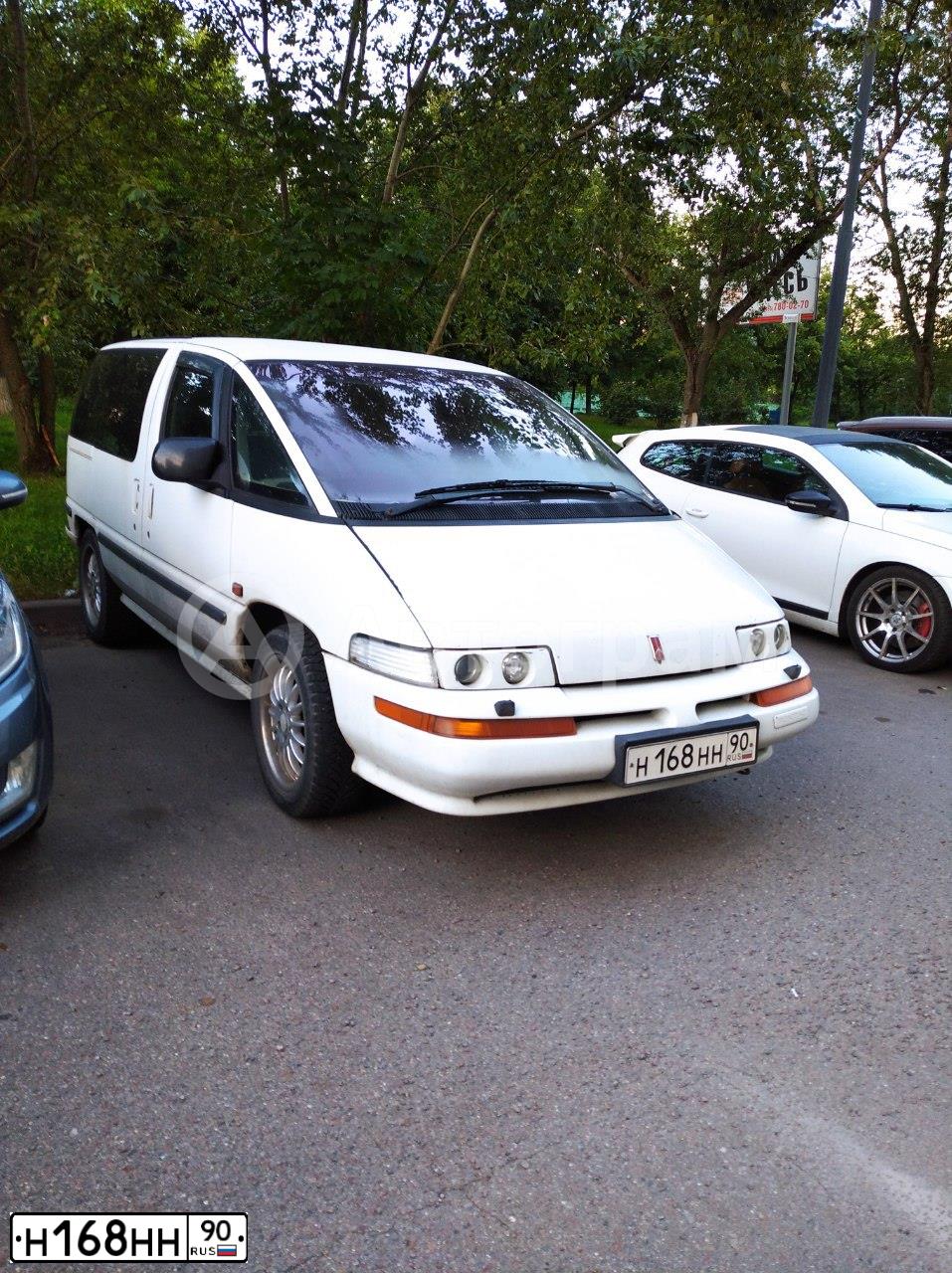 Фото автомобиля OLDSMOBILE SILHOUETTE, 1992 — госномер Н168НН90. Цвет: Белый