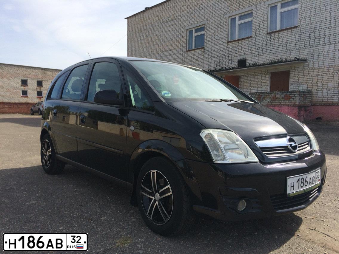 Фото автомобиля OPEL MERIVA, 2006 — госномер Н186АВ32. Цвет: ЧЕРНЫЙ