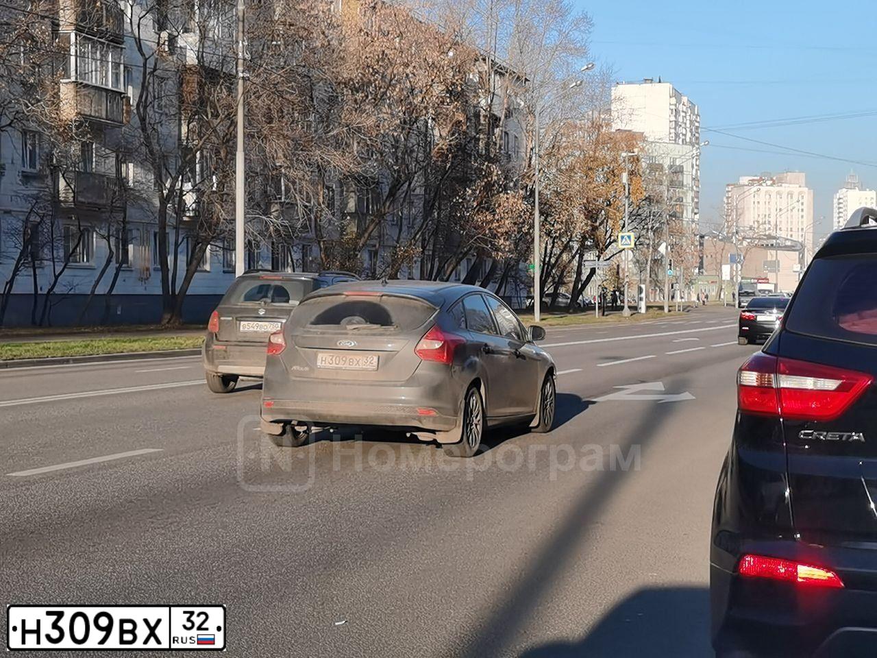 Фото автомобиля FORD FOCUS, 2011 — госномер О315УО46. Цвет: темно-серый