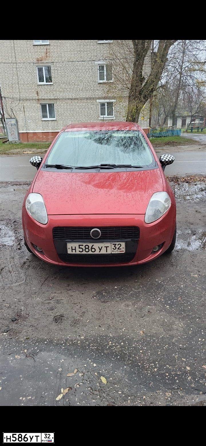 Фото автомобиля FIAT PUNTO, 2007 — госномер Н586УТ32. Цвет: БОРДОВЫЙ