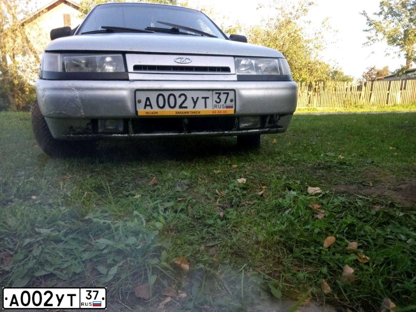 Фото автомобиля LADA 2112, 2003 — госномер А002УТ37. Цвет: Серебристо-серый