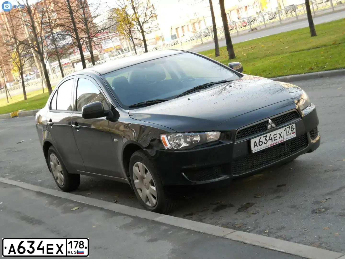 Фото автомобиля MITSUBISHI LANCER, 2010 — госномер С766ЕМ198. Цвет: ЧЕРНЫЙ