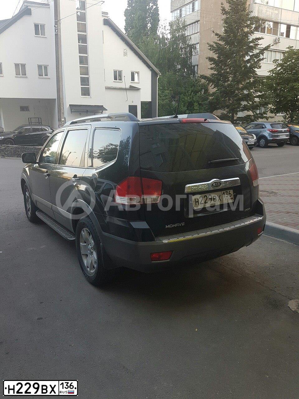 Фото автомобиля KIA MOHAVE / BORREGO, 2012 — госномер Н229ВХ136. Цвет: ЧЕРНЫЙ