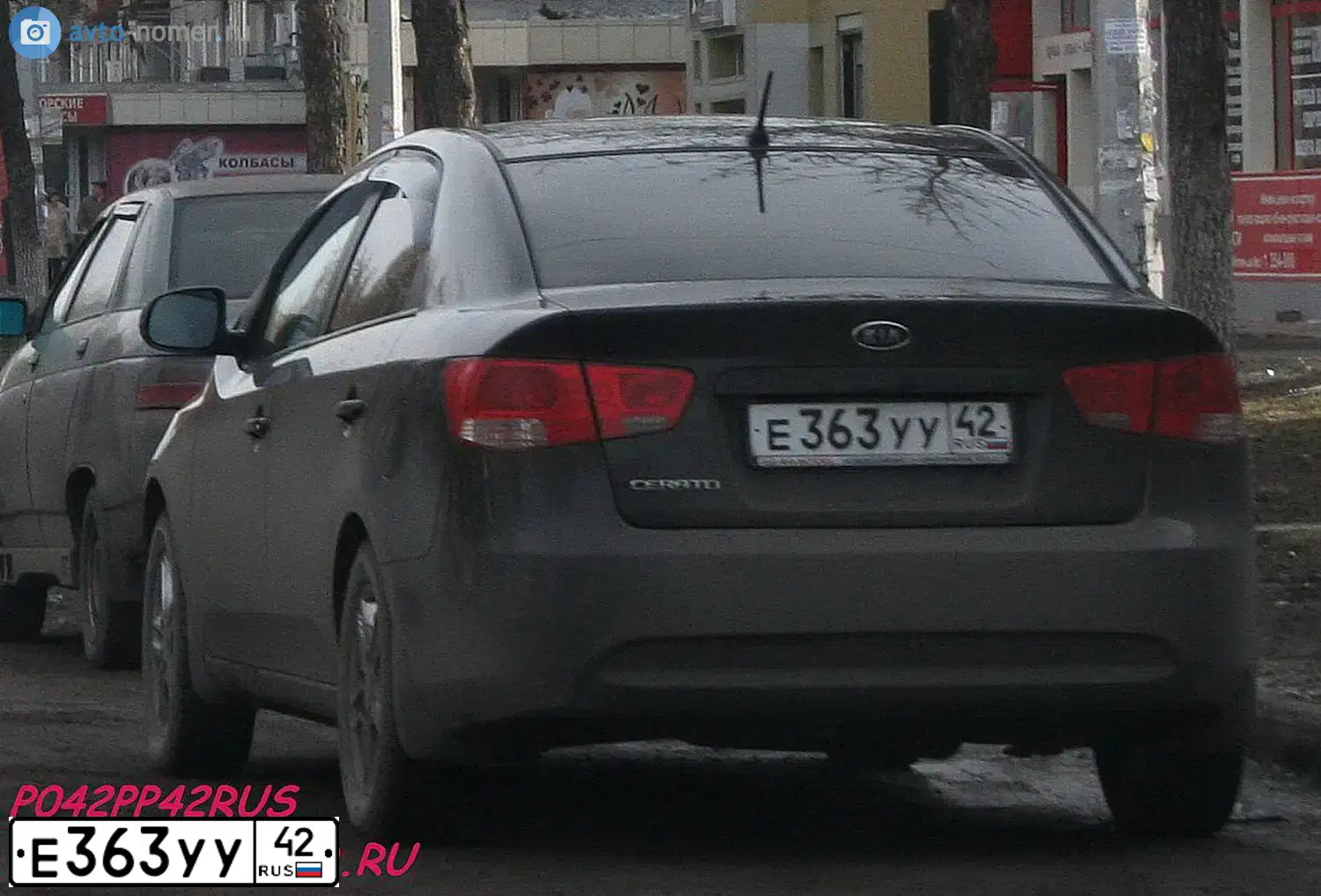 Фото автомобиля KIA CERATO, 2010 — госномер Е363УУ42. Цвет: ЧЕРНЫЙ