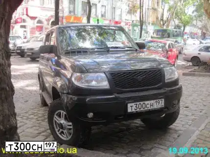 Фото автомобиля UAZ 3163 PATRIOT, 2009 — госномер Т300СН197. Цвет: ЧЕРНЫЙ