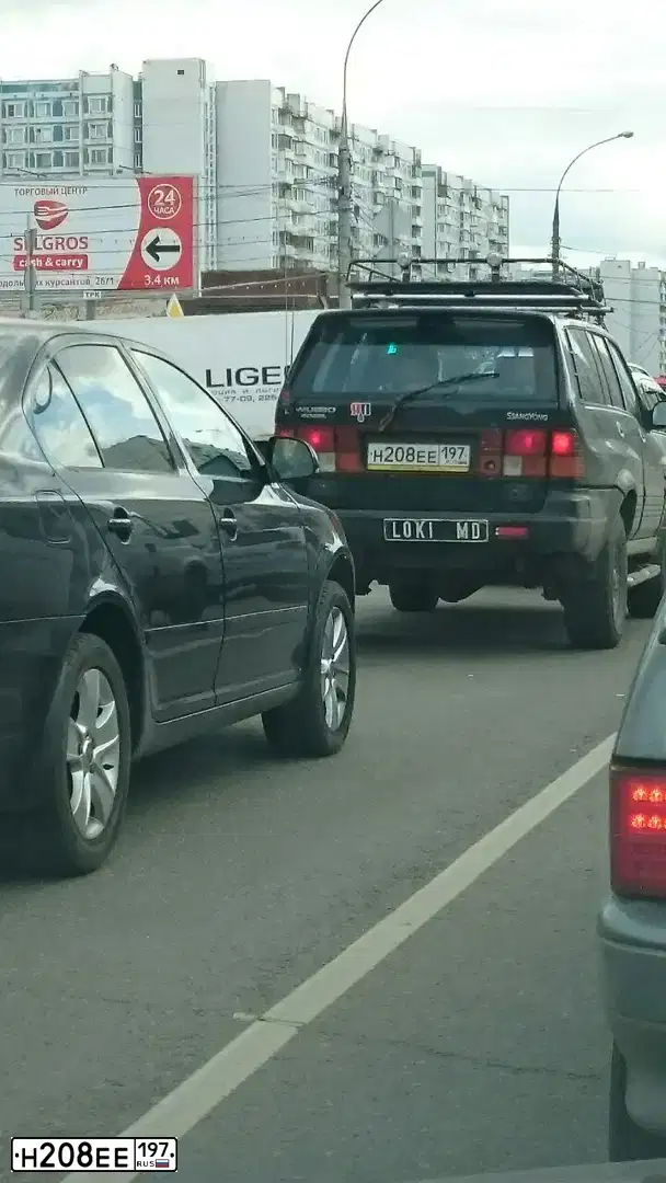 Фото автомобиля SSANGYONG MUSSO, 1994 — госномер Н208ЕЕ197. Цвет: ЧЕРНЫЙ