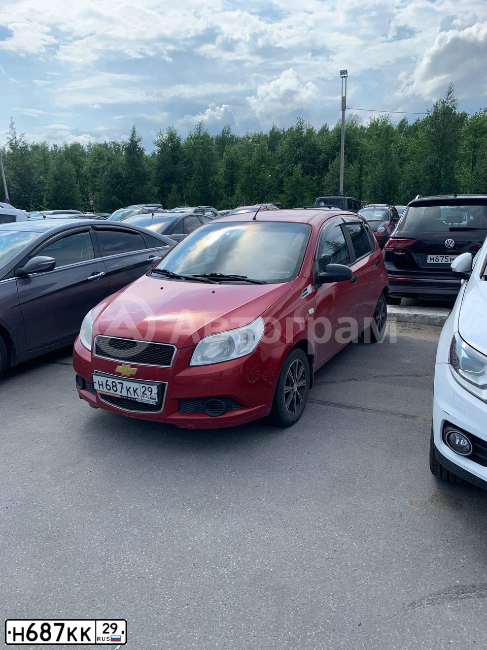 Фото автомобиля CHEVROLET AVEO, 2008 — госномер О743ХС29. Цвет: Красный