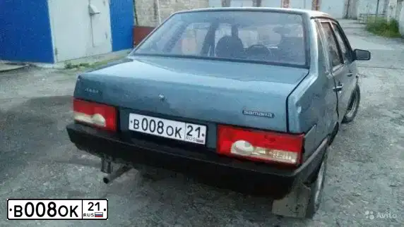 Фото автомобиля LADA 2111, 1999 — госномер В008ОК21. Цвет: Серебристо-зелено-голубой