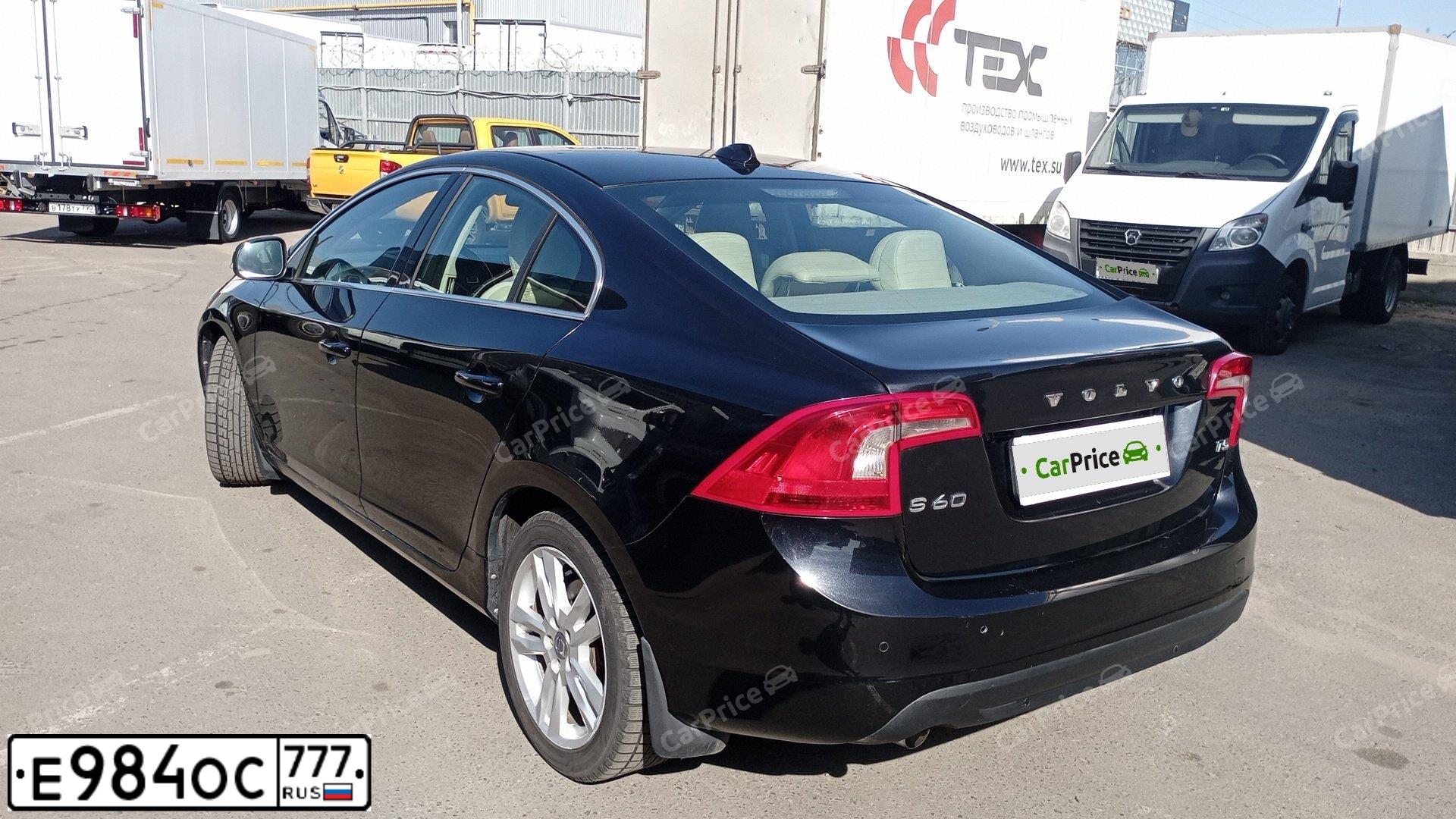 Фото автомобиля VOLVO S60, 2012 — госномер Е984ОС777. Цвет: ЧЕРНЫЙ