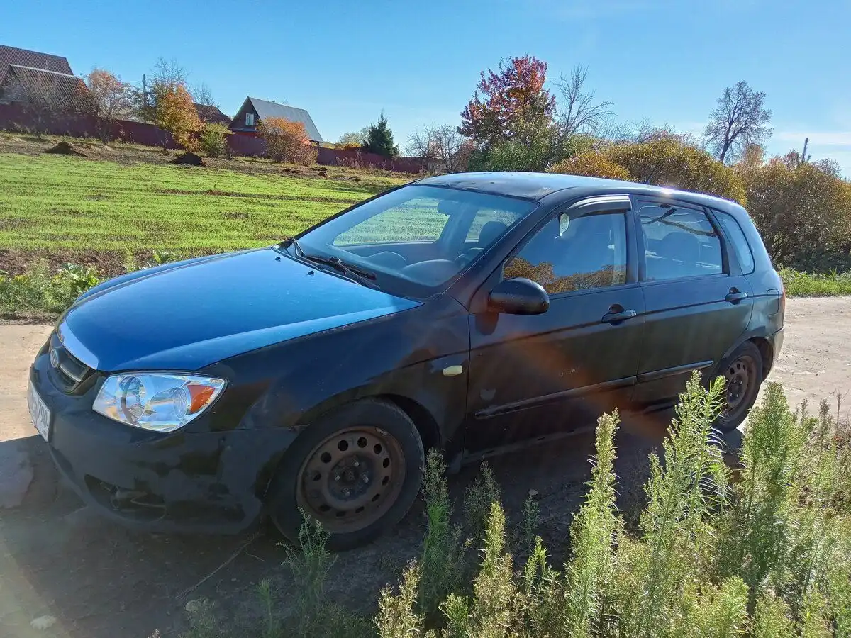 Фото автомобиля KIA CERATO, 2006 — госномер М376ТК797. Цвет: ЧЕРНЫЙ