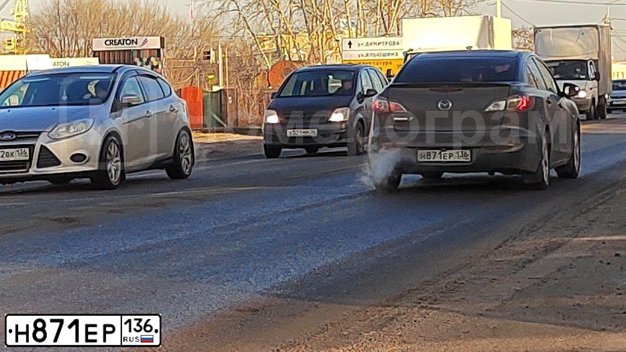 Фото автомобиля MAZDA 3, 2011 — госномер Н871ЕР136. Цвет: ТЕМНО-СЕРЫЙ