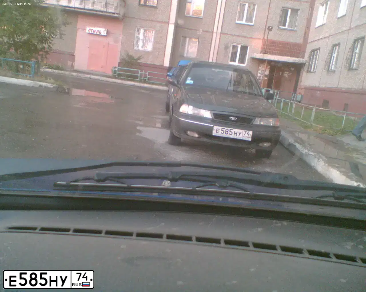 Фото автомобиля DAEWOO NEXIA, 2002 — госномер С152ЕС174. Цвет: СЕРО-ЗЕЛЕНЫЙ