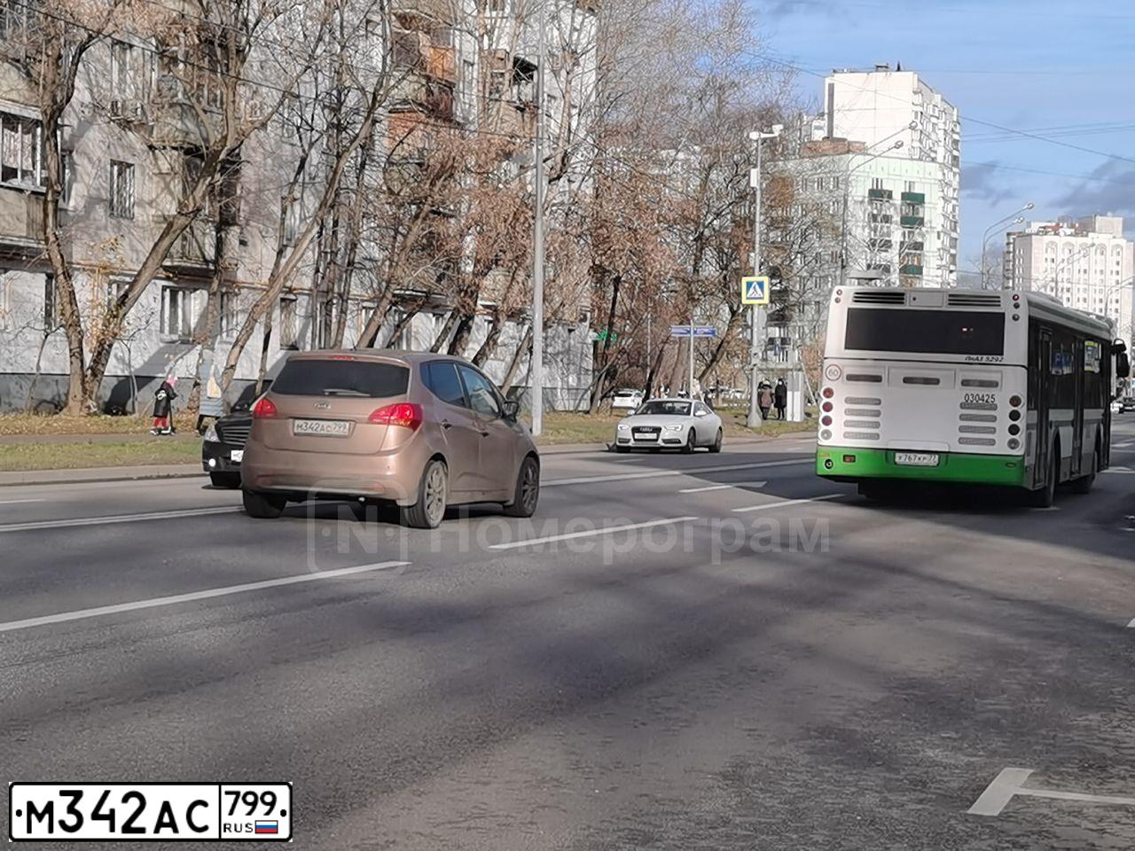 Фото автомобиля KIA VENGA, 2012 — госномер М342АС799. Цвет: Коричневый