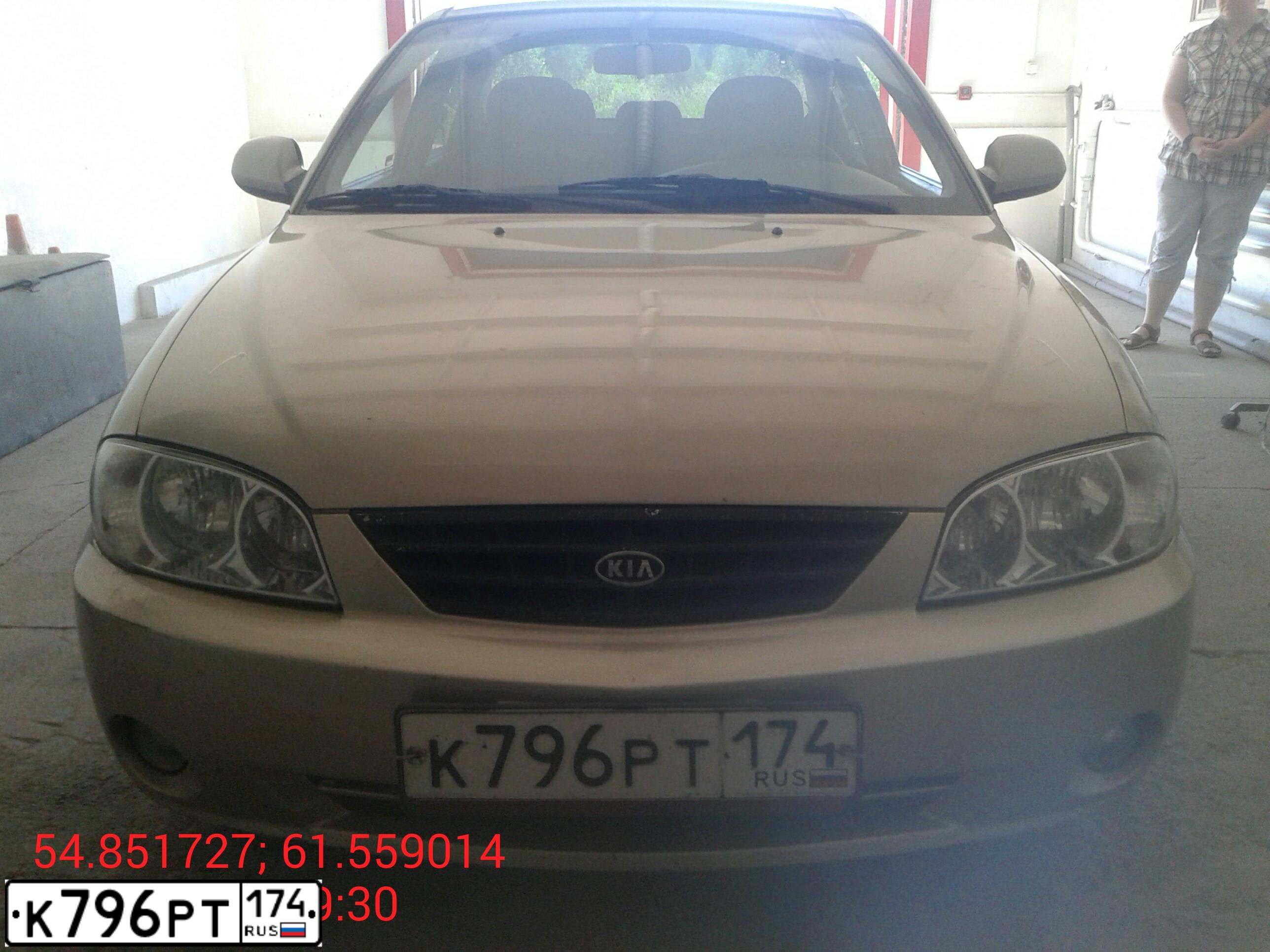 Фото автомобиля KIA SPECTRA, 2007 — госномер К796РТ174. Цвет: Золотисто-бежевый