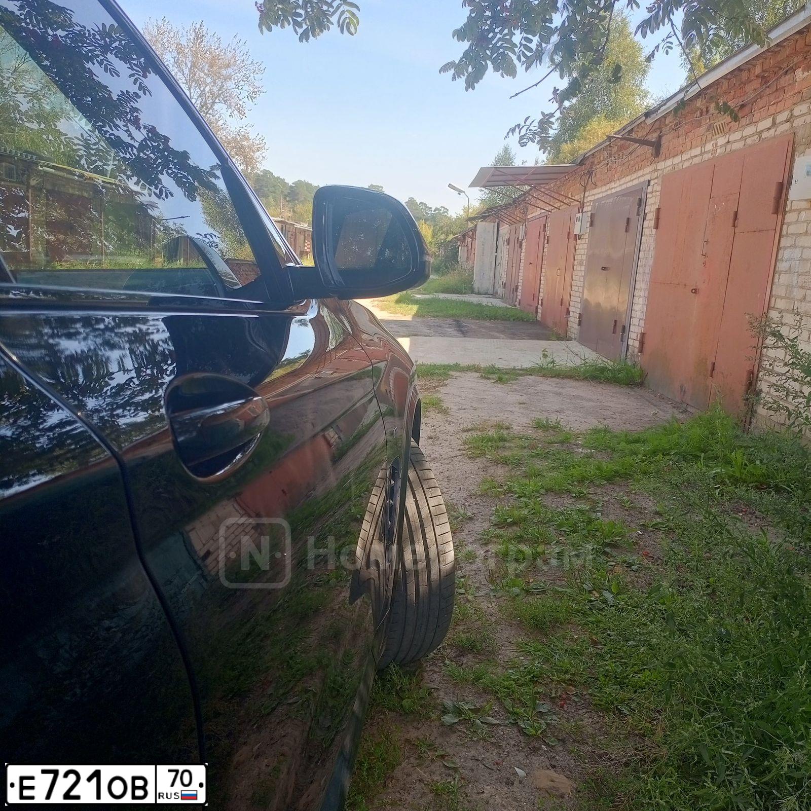 Фото автомобиля MITSUBISHI PAJERO, 2012 — госномер Е721ОВ70. Цвет: ЧЕРНЫЙ