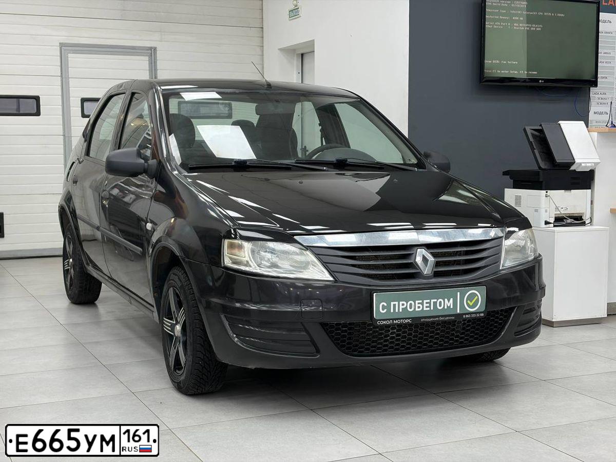 Фото автомобиля RENAULT LOGAN, 2010 — госномер Е665УМ161. Цвет: ЧЕРНЫЙ