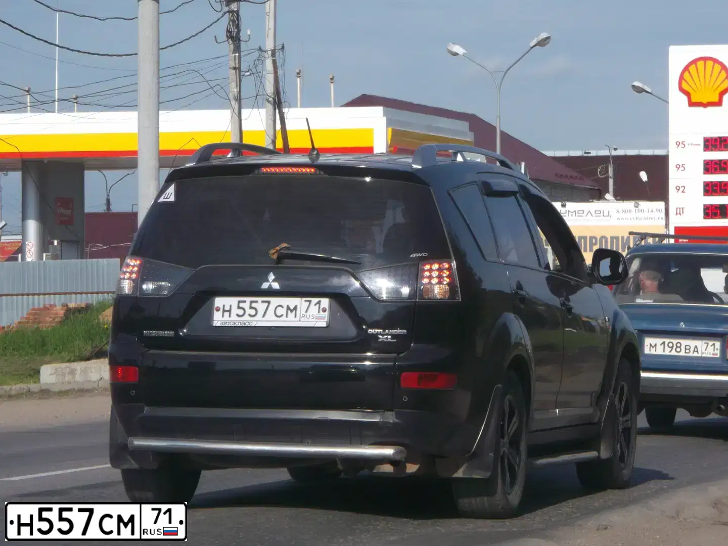 Фото автомобиля MITSUBISHI OUTLANDER, 2007 — госномер Н557СМ71. Цвет: ЧЕРНЫЙ