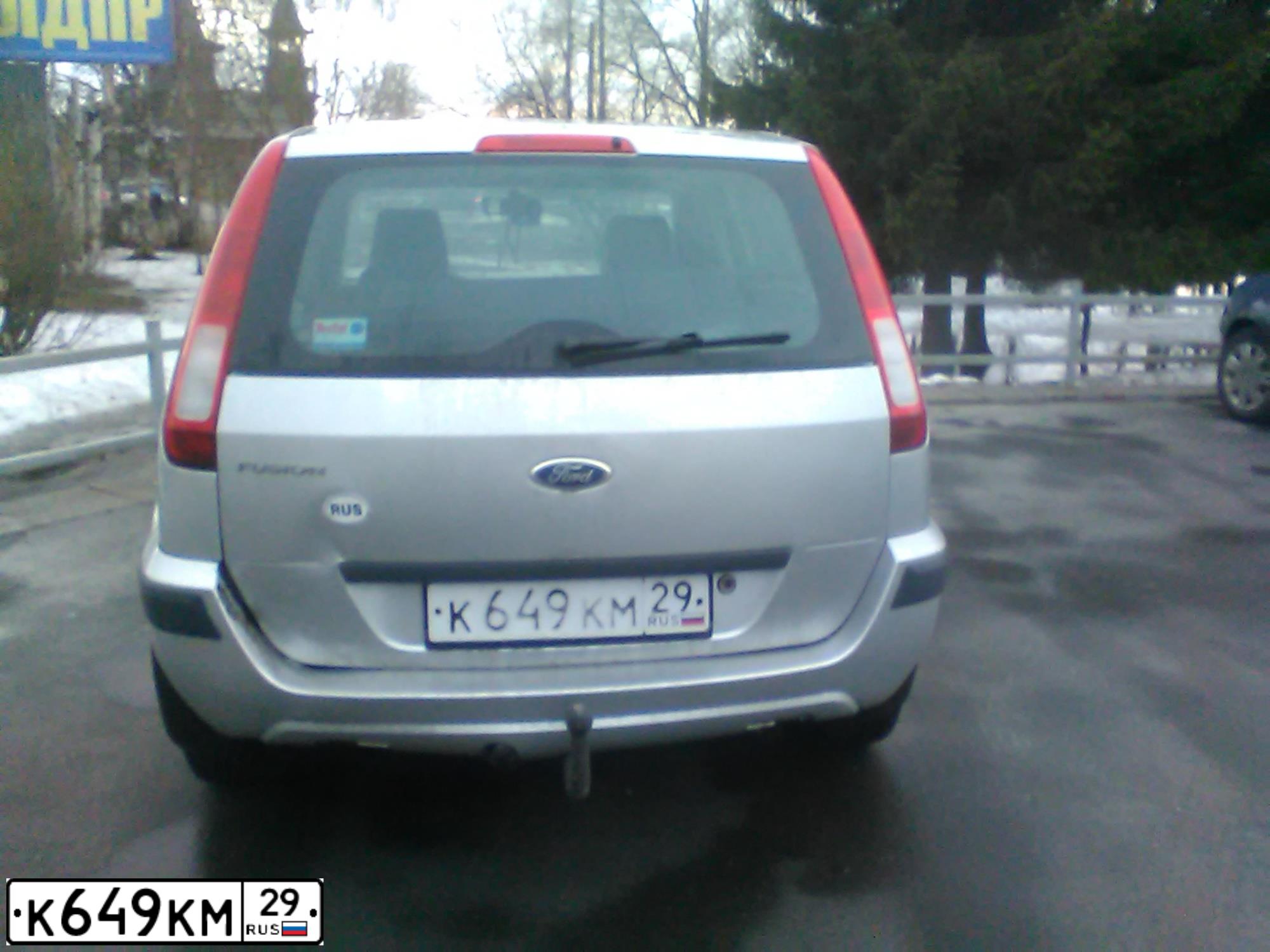 Фото автомобиля FORD FUSION, 2006 — госномер К649КМ29. Цвет: СВЕТЛО-СЕРЫЙ