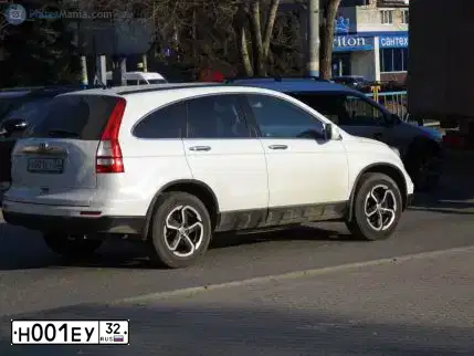 Фото автомобиля HONDA CR-V, 2012 — госномер Е099ТК32. Цвет: Белый