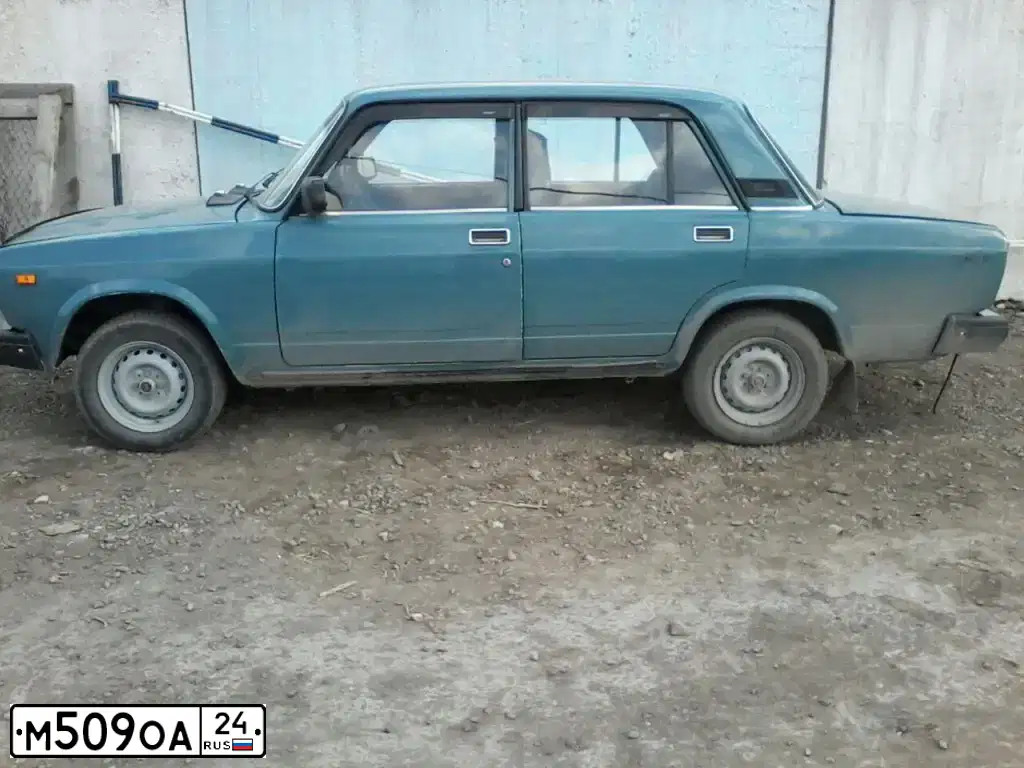 Фото автомобиля LADA 2107, 2003 — госномер М509ОА24. Цвет: СЕРО-СИНИЙ